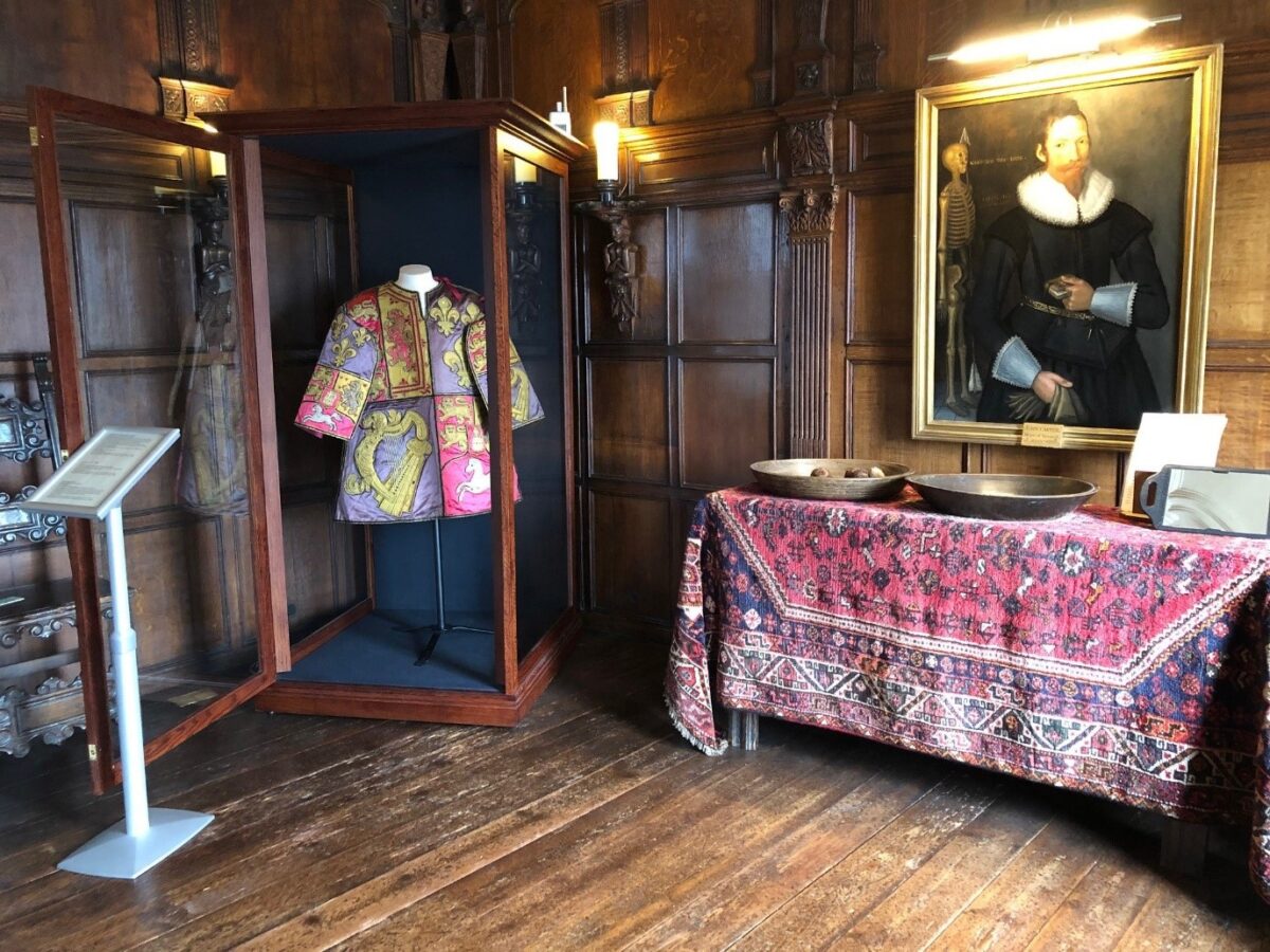 The tabard in the display case in Elizabethan House, Great Yarmouth, Norfolk