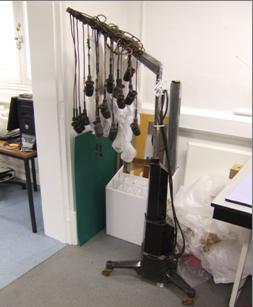 Perming machine in the conservation lab before treatment