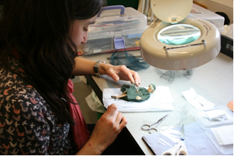 Repairing the dress of lady of the house, by Alice Forkes, Conservation Technician