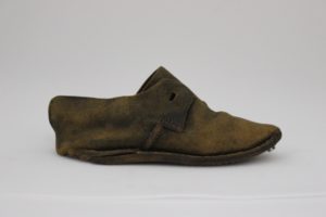 Child's shoe during conservation
