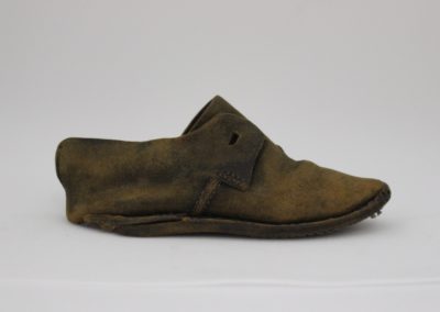 Shipwreck child's shoe during conservation