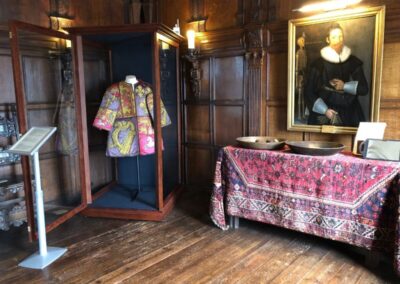 The tabard in the display case in Elizabethan House, Great Yarmouth, Norfolk